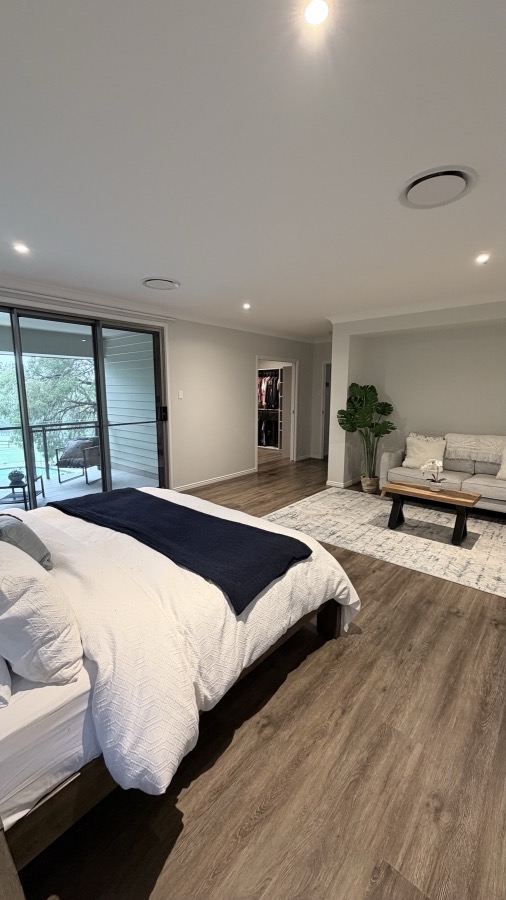 Bedroom with balcony view after a FYS Cleaning Services clean, Brisbane home
